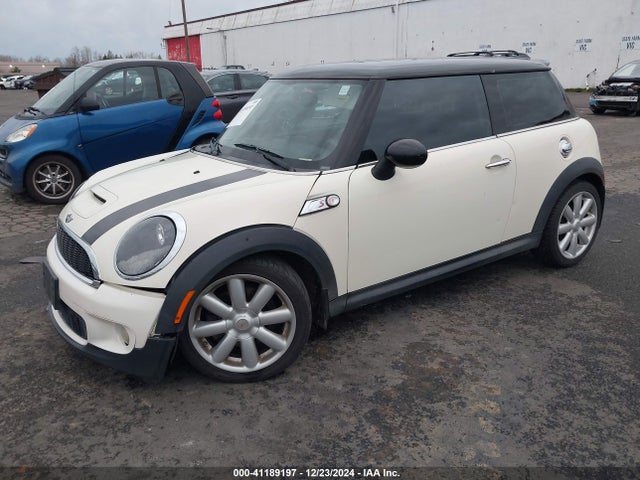 2009 MINI COOPER S WMWMF73519TW84372 Photo 1