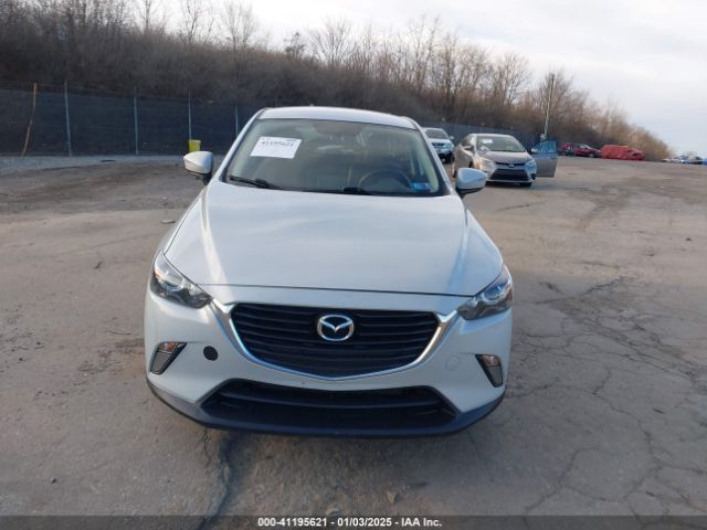 JM1DKFC79G0138217 Mazda Cx-3 Touring