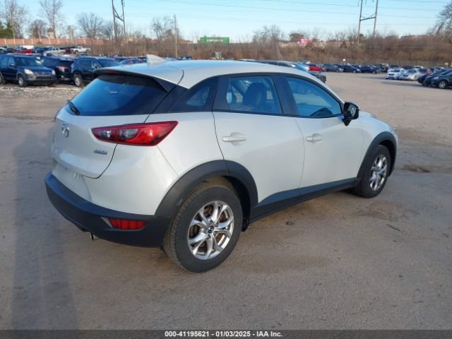 JM1DKFC79G0138217 Mazda Cx-3 Touring