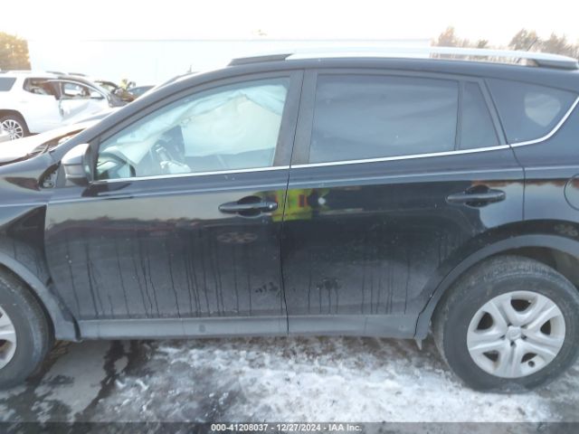 2T3BFREV9EW160185 Toyota RAV4 LE