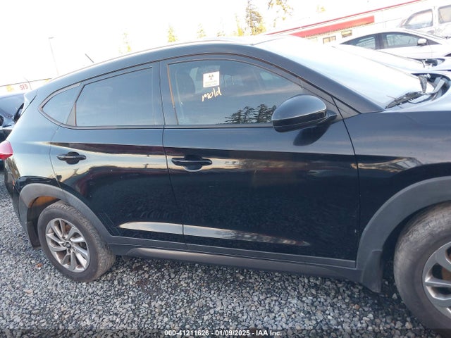 KM8J33A40GU041810 Hyundai TUCSON SE