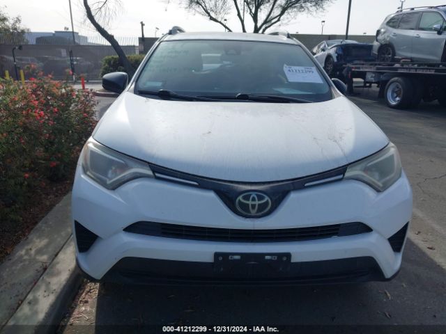 JTMZFREV3HJ703564 Toyota RAV4 LE