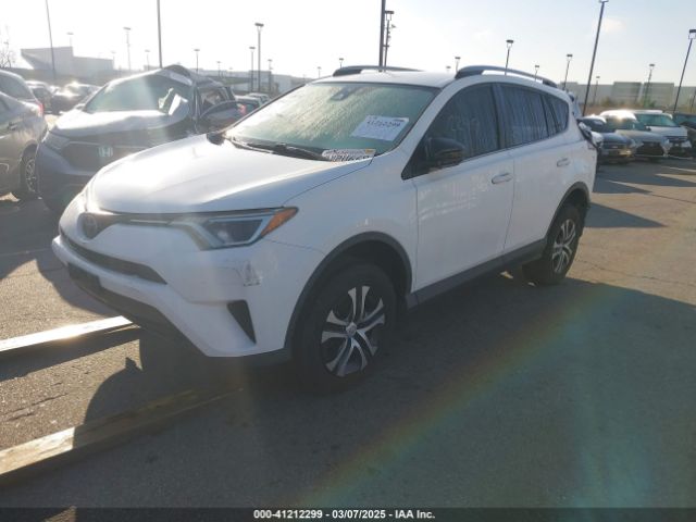JTMZFREV3HJ703564 Toyota RAV4 LE
