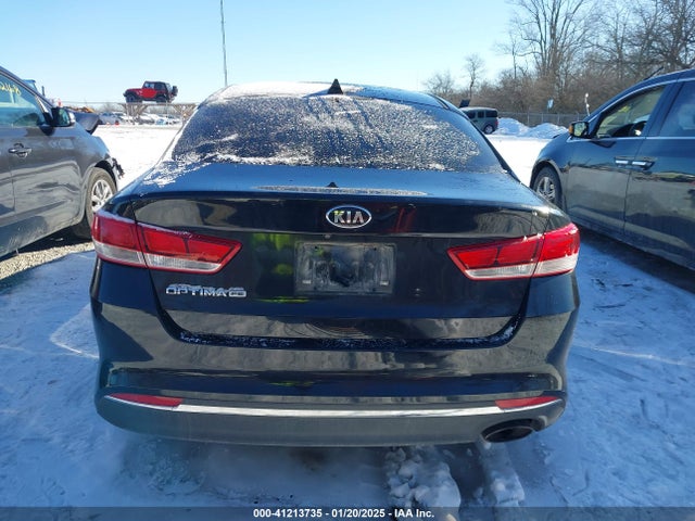 5XXGT4L35GG099295 KIA Optima Lx