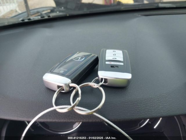 JH4KC1F55EC001030 Acura RLX