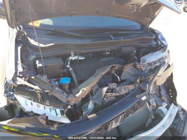5FNYF8H07KB015720 Honda Passport Elite