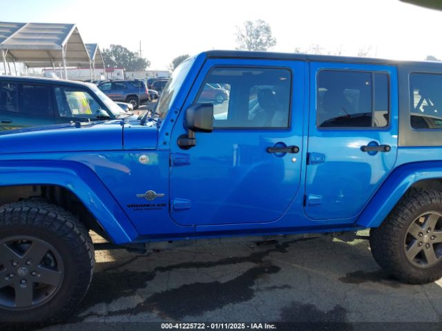 1C4BJWDG9FL586639 Jeep Wrangler Unlimited Freedom Edition