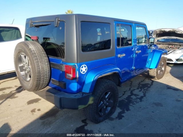 1C4BJWDG9FL586639 Jeep Wrangler Unlimited Freedom Edition