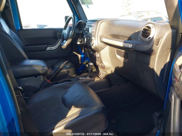 1C4BJWDG9FL586639 Jeep Wrangler Unlimited Freedom Edition