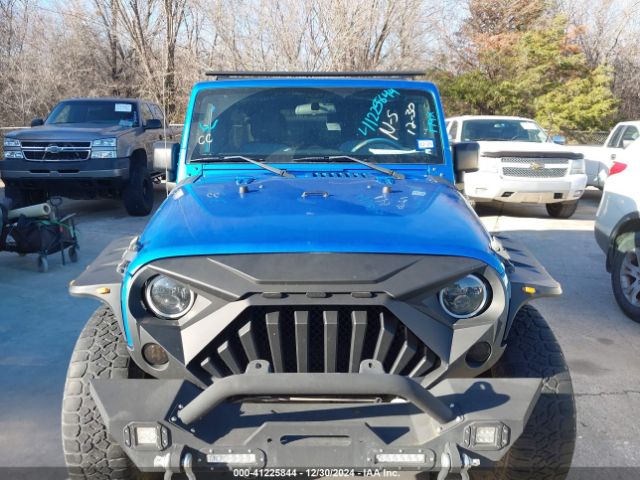 1C4BJWDG8FL513424 Jeep Wrangler Unlimited Sport