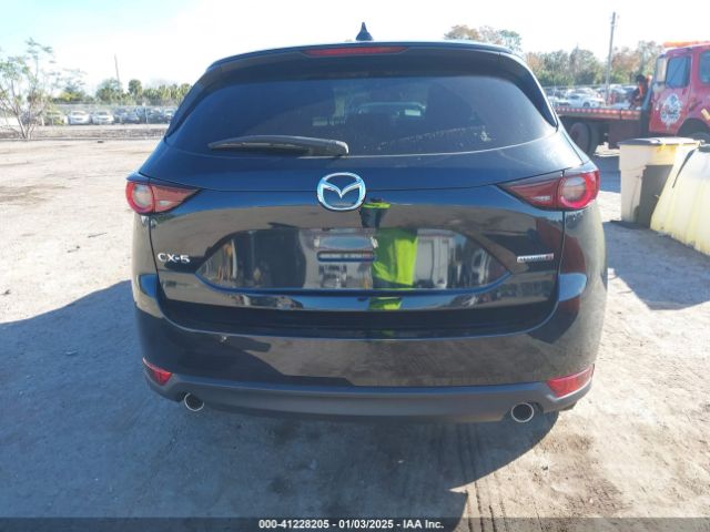 JM3KFACM0L0844451 Mazda Cx-5 Touring