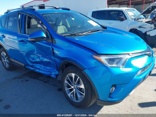 JTMRJREVXJD246089 Toyota Rav4 Hybrid Xle