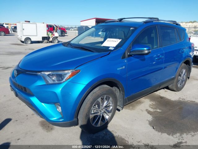 JTMRJREVXJD246089 Toyota Rav4 Hybrid Xle
