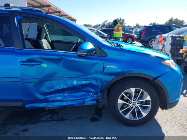 JTMRJREVXJD246089 Toyota Rav4 Hybrid Xle