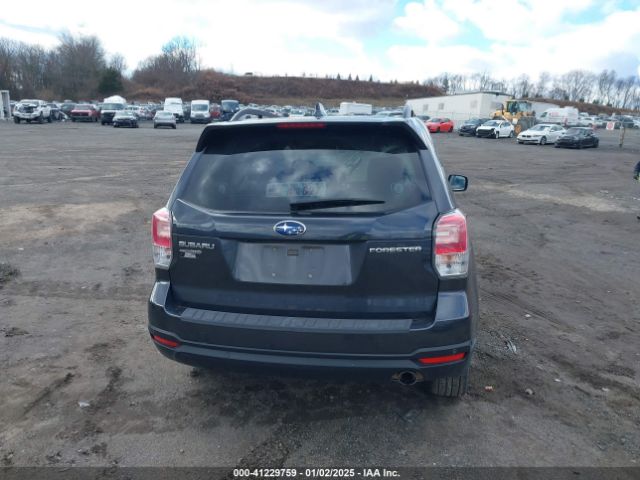 JF2SJAWC3JH614414 Subaru Forester 2.5i Touring