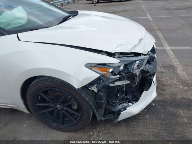 1N4AA6AP9GC398002 Nissan Maxima 3.5 Sv