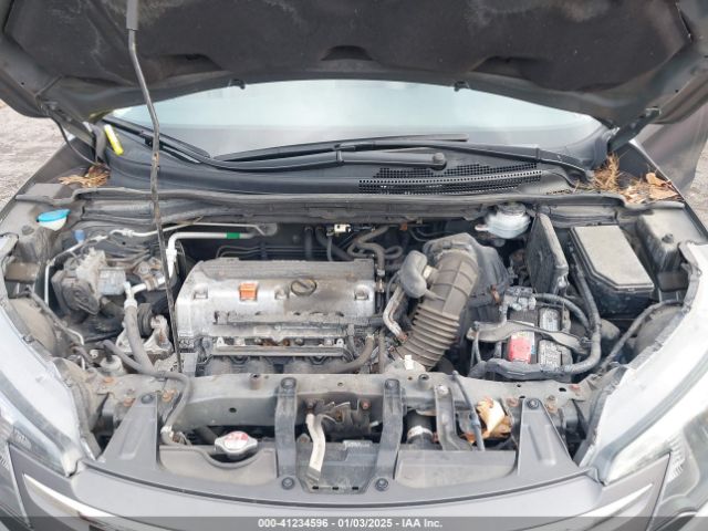 2HKRM4H34EH670095 Honda CR-V LX