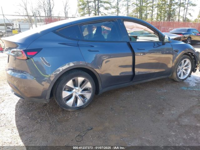 7SAYGDEF8PA048702 Tesla Model Y Performance Dual Motor All-wheel Drive