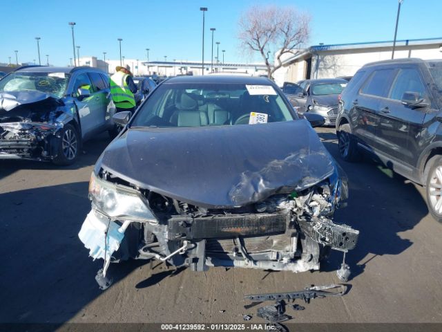 4T1BF1FK2EU773991 Toyota CAMRY SE