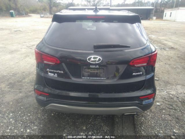 5NMZU3LB9JH078370 Hyundai Santa Fe Sport 2.4l