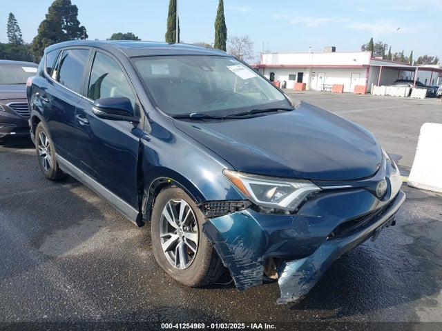 2018 JTMWFREV6JD124656 main image