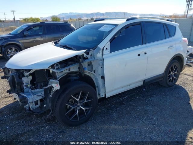 JTMNFREV0GJ090672 Toyota RAV4 SE