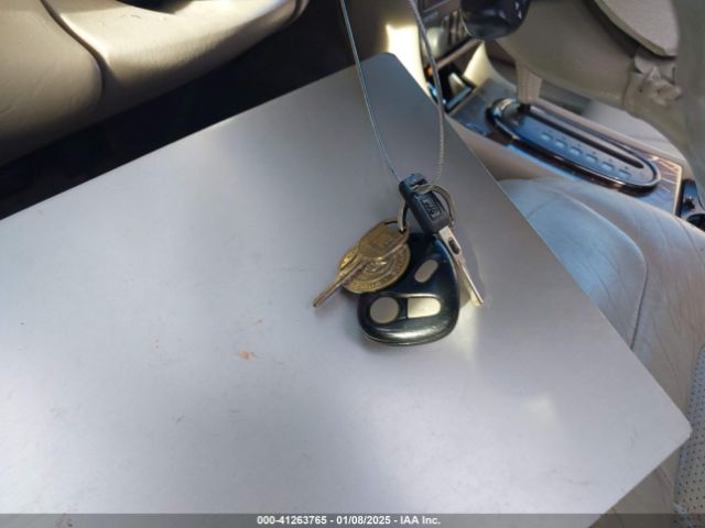 1999 CADILLAC DEVILLE 1G6KF5490XU705979 Photo 10