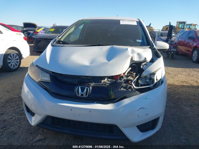 JHMGK5H58GX003234 Honda FIT LX