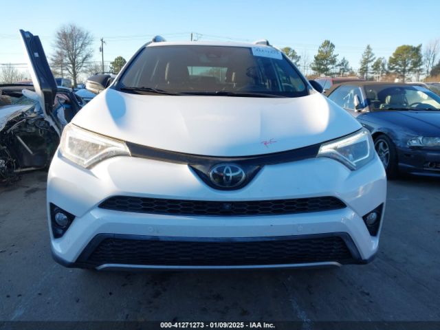 JTMNFREV4JD118964 Toyota RAV4 SE