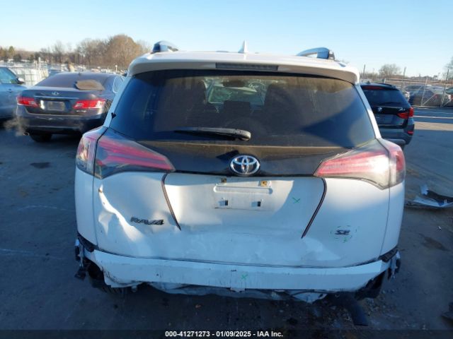 JTMNFREV4JD118964 Toyota RAV4 SE
