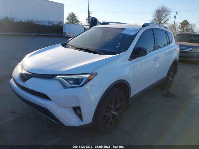 JTMNFREV4JD118964 Toyota RAV4 SE