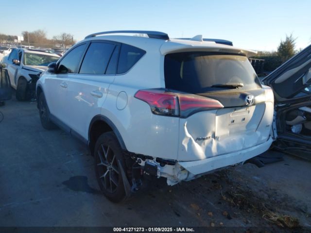 JTMNFREV4JD118964 Toyota RAV4 SE