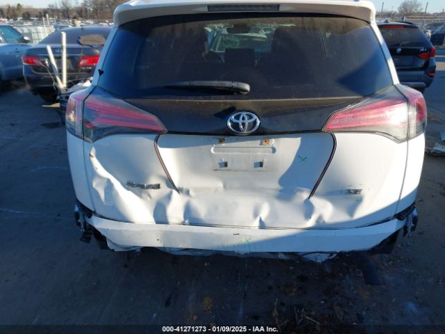JTMNFREV4JD118964 Toyota RAV4 SE