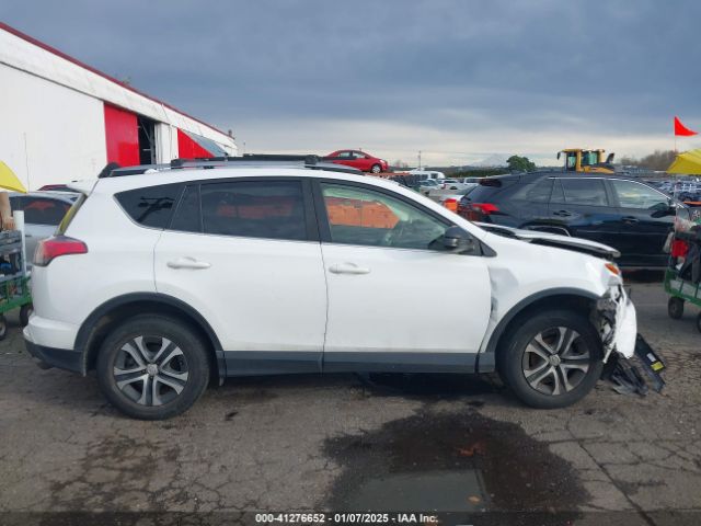 JTMBFREV9JJ254463 Toyota RAV4 LE