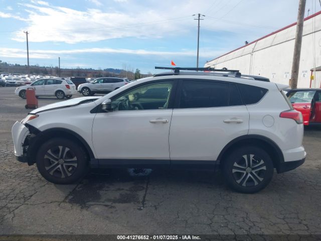 JTMBFREV9JJ254463 Toyota RAV4 LE