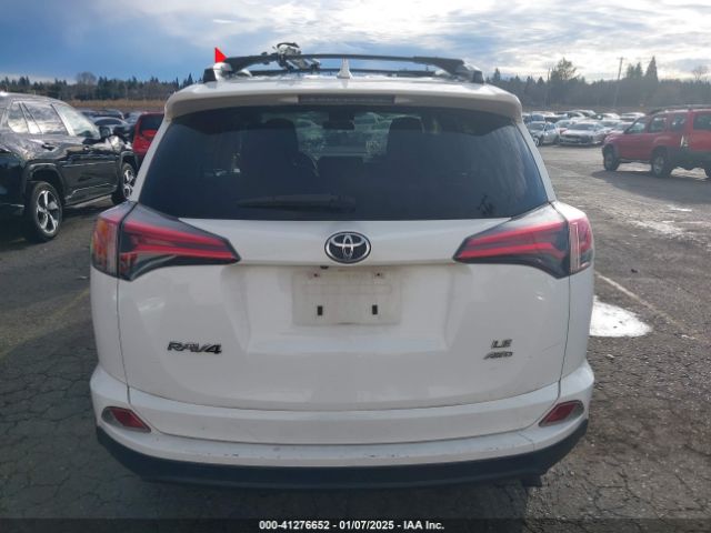 JTMBFREV9JJ254463 Toyota RAV4 LE