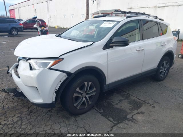 JTMBFREV9JJ254463 Toyota RAV4 LE