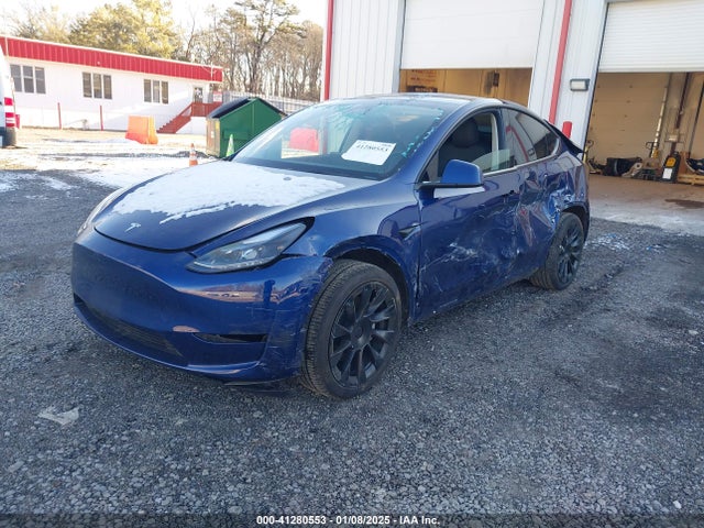 2023 TESLA MODEL Y 7SAYGDEE6PF804764 Photo 1