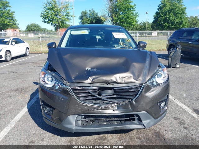 2016 Mazda Cx-5 Touring მანქანა იყიდება აუქციონზე, vin: JM3KE4CY0G0903043, აუქციონის ნომერი: 41282721