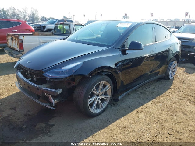 2024 TESLA MODEL Y 7SAYGDED3RF050698 Photo 1