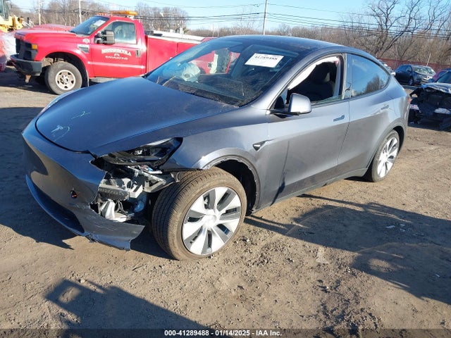 2023 TESLA MODEL Y 7SAYGDEE1PF945600 Photo 1