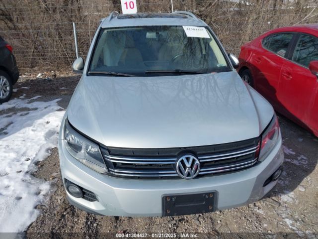 WVGBV3AXXEW523551 Volkswagen Tiguan Sel