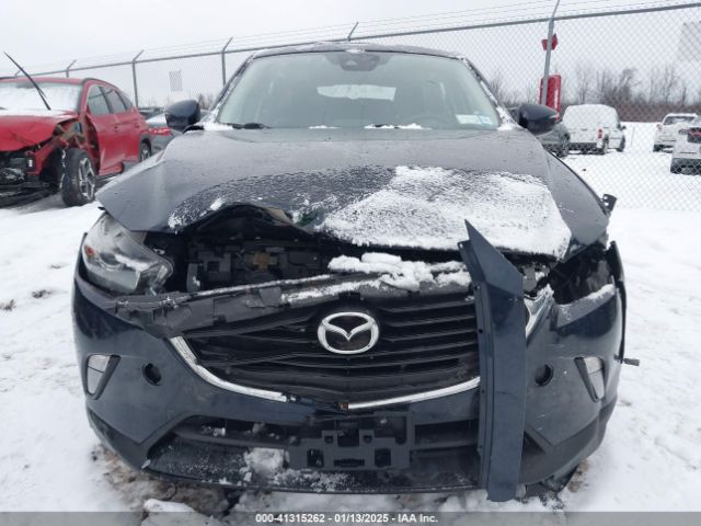 JM1DKFC76J1311418 Mazda Cx-3 Touring