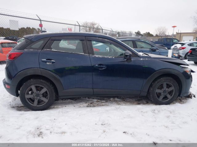 JM1DKFC76J1311418 Mazda Cx-3 Touring