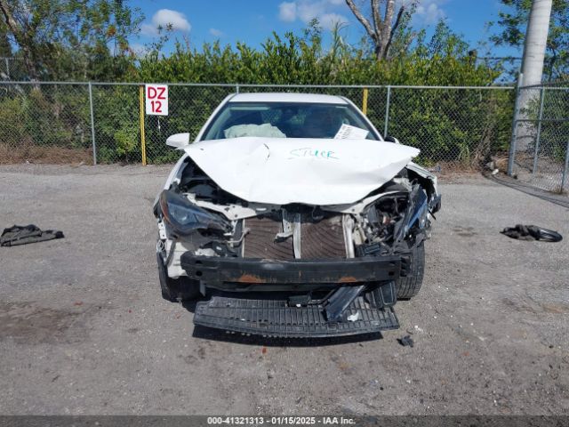 5YFBURHE6JP849560 Toyota COROLLA LE