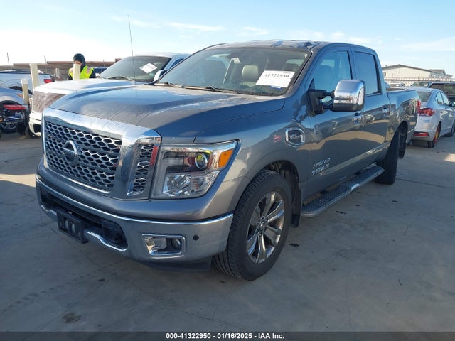 1N6AA1E64HN572012 Nissan Titan Sl