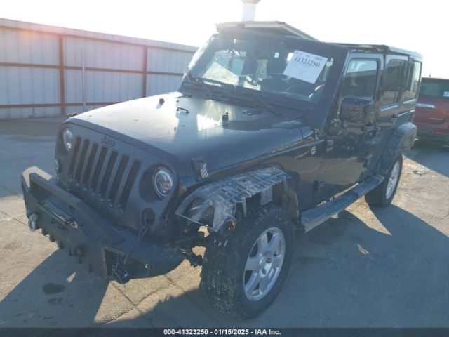 1C4BJWEG9EL273863 Jeep Wrangler Unlimited Altitude