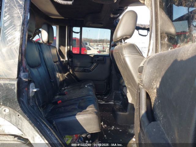 1C4BJWEG9EL273863 Jeep Wrangler Unlimited Altitude
