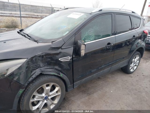 1FMCU0JX1EUC52347 Ford Escape Titanium