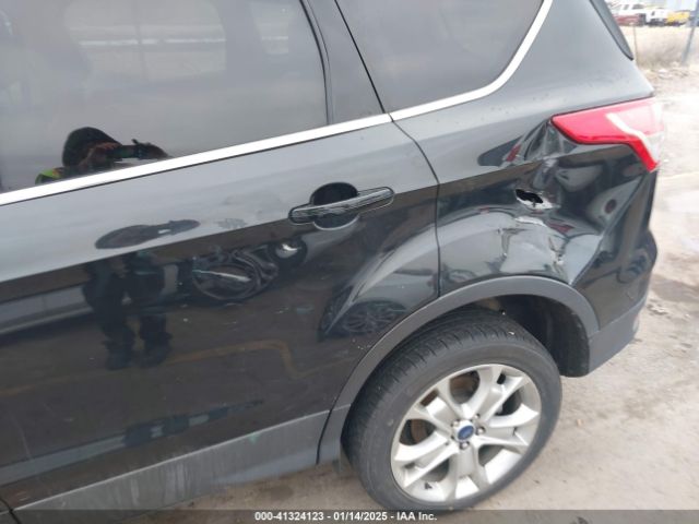 1FMCU0JX1EUC52347 Ford Escape Titanium